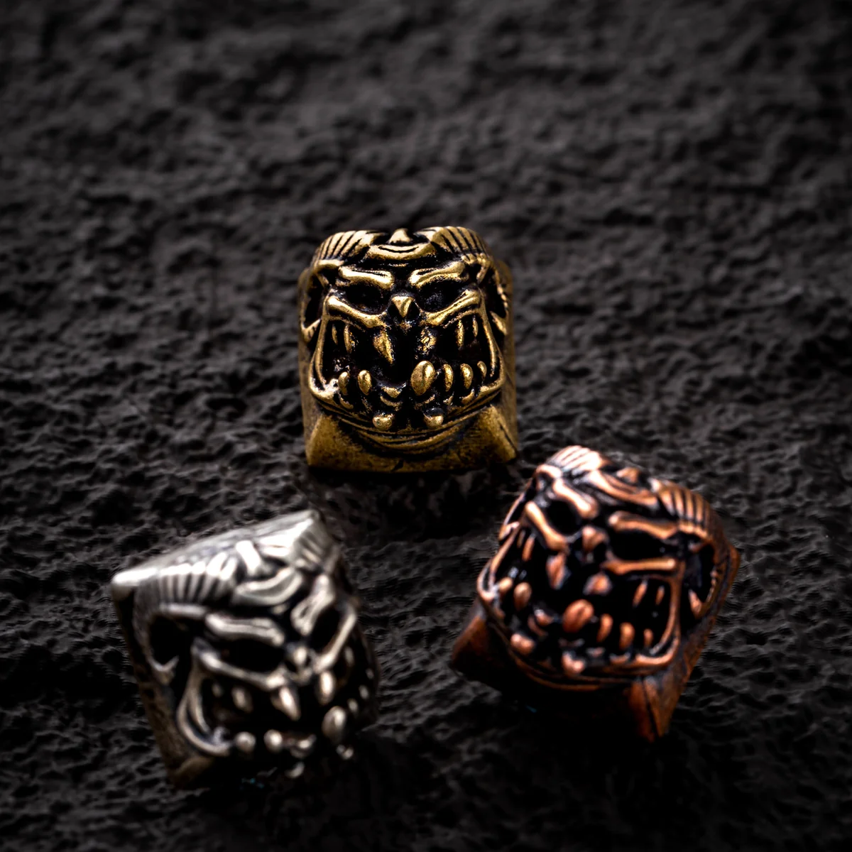 Close-up of Disaster Relief Demon Keycaps, showcasing intricate industrial metallic details from a unique angle, embodying artistic design.