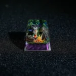 Close-up view of the handcrafted Don't Starve Wilson artisan keycap, intricately hand-painted resin showcasing its distinctive gothic art style.