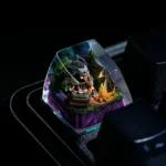 Close-up of the Don't Starve Wilson handcrafted resin artisan keycap, highlighting the intricate hand-painted details and gothic art style from a side view.
