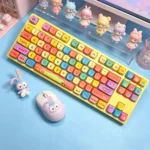 Vibrant dopamine rainbow PBT MOA keycaps set, showcasing smooth gradient hues and modern profile from playful angles, perfect for an expressive keyboard.