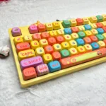 Vibrant Dopamine Rainbow PBT MOA Keycaps set, playfully shown from various angles, highlighting smooth MOA profile and cheerful gradient rainbow hues.