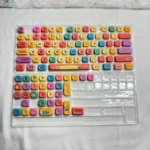 A detailed gallery view of the Vibrant Dopamine Rainbow PBT MOA Keycaps Set, showcasing the playful gradient hues and smooth MOA profile.