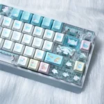 A collection of adorable Cinnamoroll PBT+PC side-printed keycaps set, showcasing various angles of the dreamy pastel set, perfect for a customization keyboard.