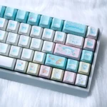 Adorable Cinnamoroll PBT+PC side-printed keycaps set, showcasing dreamy pastel designs from various angles for a uniquely cute keyboard.