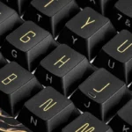 Exquisite Dunhuang Silk Road PBT Keycap Set displayed from various angles, revealing intricate ancient murals, Silk Road motifs, and desert landscape.