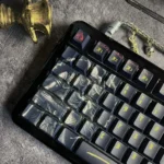 Premium Elden Ring Malenia, Blade of Miquella keycaps set, showcasing intricate dark fantasy artistry with semi-translucent effects from multiple angle.