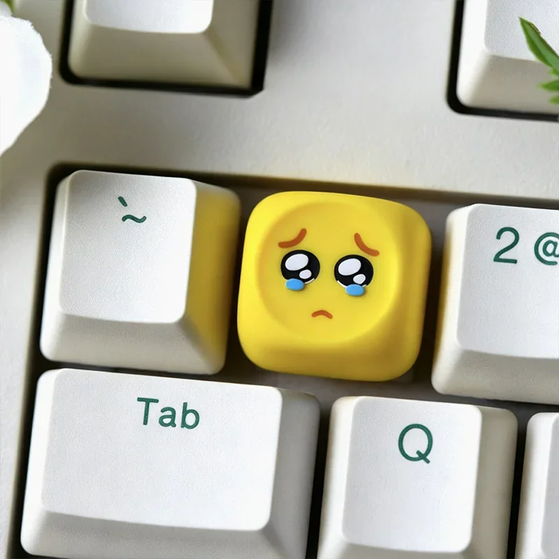 Playful handcrafted resin emoji keycaps from multiple angles. Vibrant, glossy, and perfect for personalized keyboard expression.
