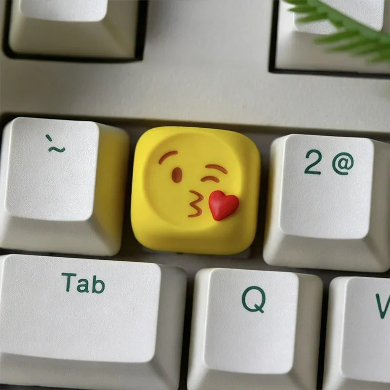 Vibrant handcrafted resin emoji keycap depicting a playful heart-eyes face, adding a touch of personalized love to your custom ESC key.