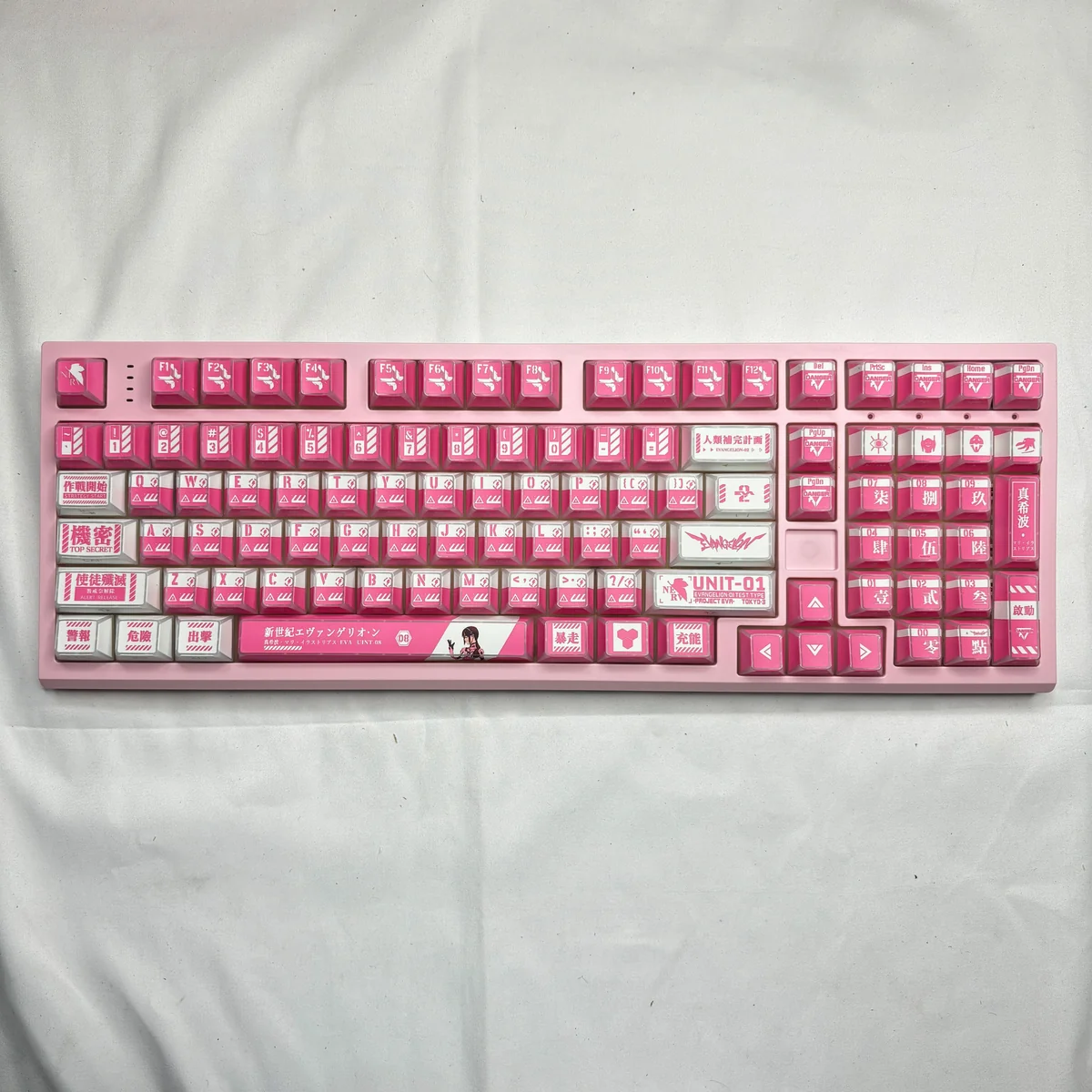 Vibrant EVA Mari Keycaps Set featuring a glowing Evangelion Mari Makinami silhouette design, showcasing this artistic backlit PBT keycap set.