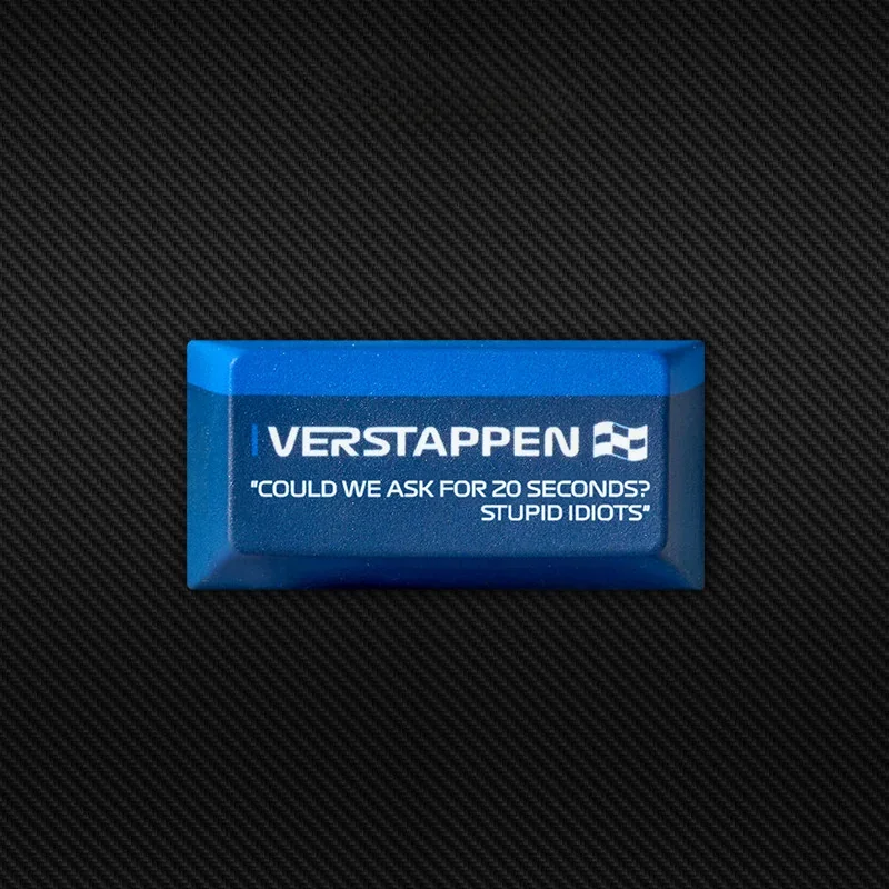 Close-up views of the Max Verstappen F1 Keycap, showcasing vibrant dye-sublimated designs and iconic racing quotes from various angles for dedicated design.