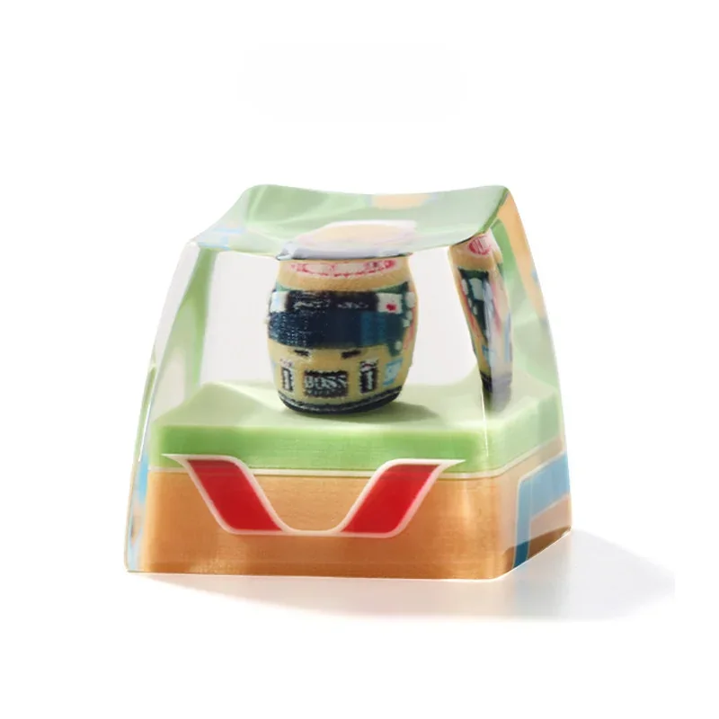 Premium F1 keycap featuring a highly detailed miniature replica of the iconic 2007 McLaren F1 Hamilton helmet tribute, showcasing its distinctive lively setup.