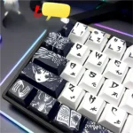 Close-up view of the unique Fallen Angel keycaps set, highlighting the ethereal gothic design and dark angelic motifs from a distinct angle.