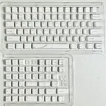 Gallery of feather pattern keycaps set, showcasing shimmering ethereal feather motifs and comfortable Cherry profile from various angles.