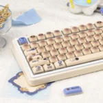 A close-up view of the playful Gas Tank Keycaps Set, showcasing their durable PBT material and unique retro gas can design from multiple angles.