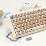 Playful gas Tank keycaps set in a vibrant, whimsical collection, highlighting their unique retro design, durable PBT material, and MOG profile from various angle.