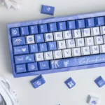 Genshin Impact Columbina keycaps set. Ethereal Moon Maiden art from a unique angle, highlighting its mysterious, moonlit aesthetic. Exclusive design.