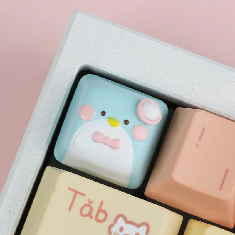 A charming, handcrafted artisan resin Gentlemen Penguin keycap, sculpted in elegant design, showcasing a unique gentleman penguin for your ESC key.