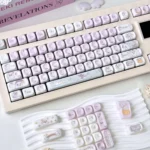 A close-up of playful, translucent PBT Ghost Haha keycaps set, displaying their ethereal glow and whimsical design from a captivating angle.