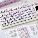 Whimsical Ghost Haha Keycaps Set, Jade edition, featuring playful laughing translucent ghosts with an ethereal, creamy PBT glow.