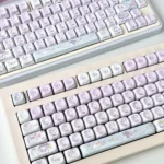 Whimsical Ghost Haha Keycaps set, translucent PBT, showing ethereal ghosts for a dreamy, playful keyboard aesthetic.