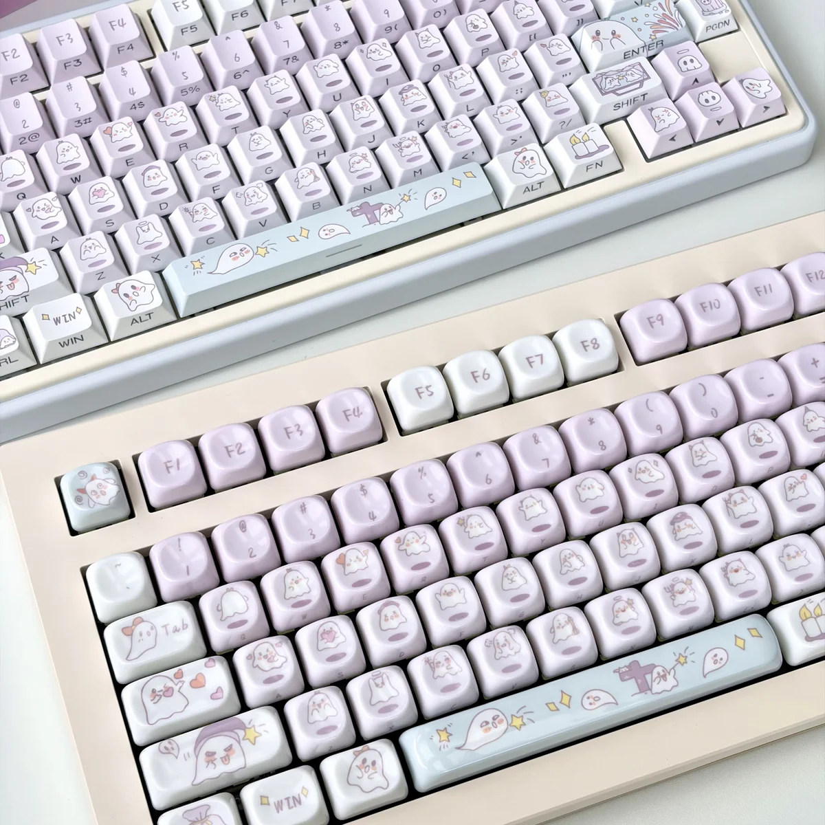 Whimsical Ghost Haha Keycaps set, translucent PBT, showing ethereal ghosts for a dreamy, playful keyboard aesthetic.