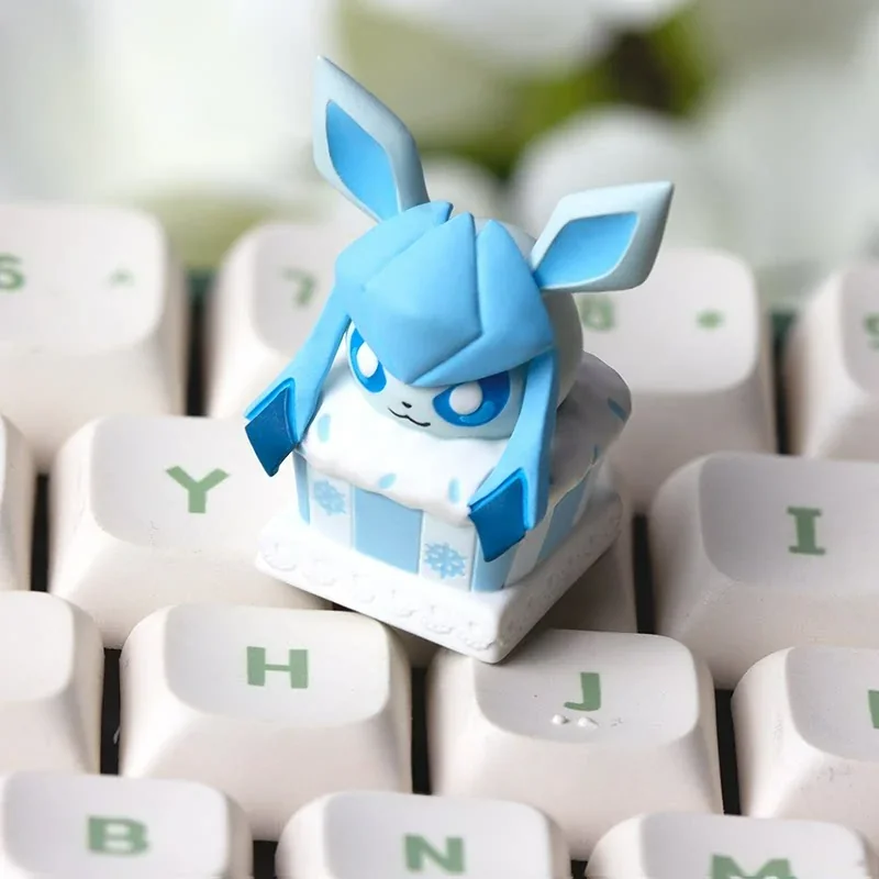 Whimsical handcrafted Glaceon cake artisan keycap for ESC, showcasing an icy Glaceon character as a charming, sculpted dessert. A unique keyboard accent.