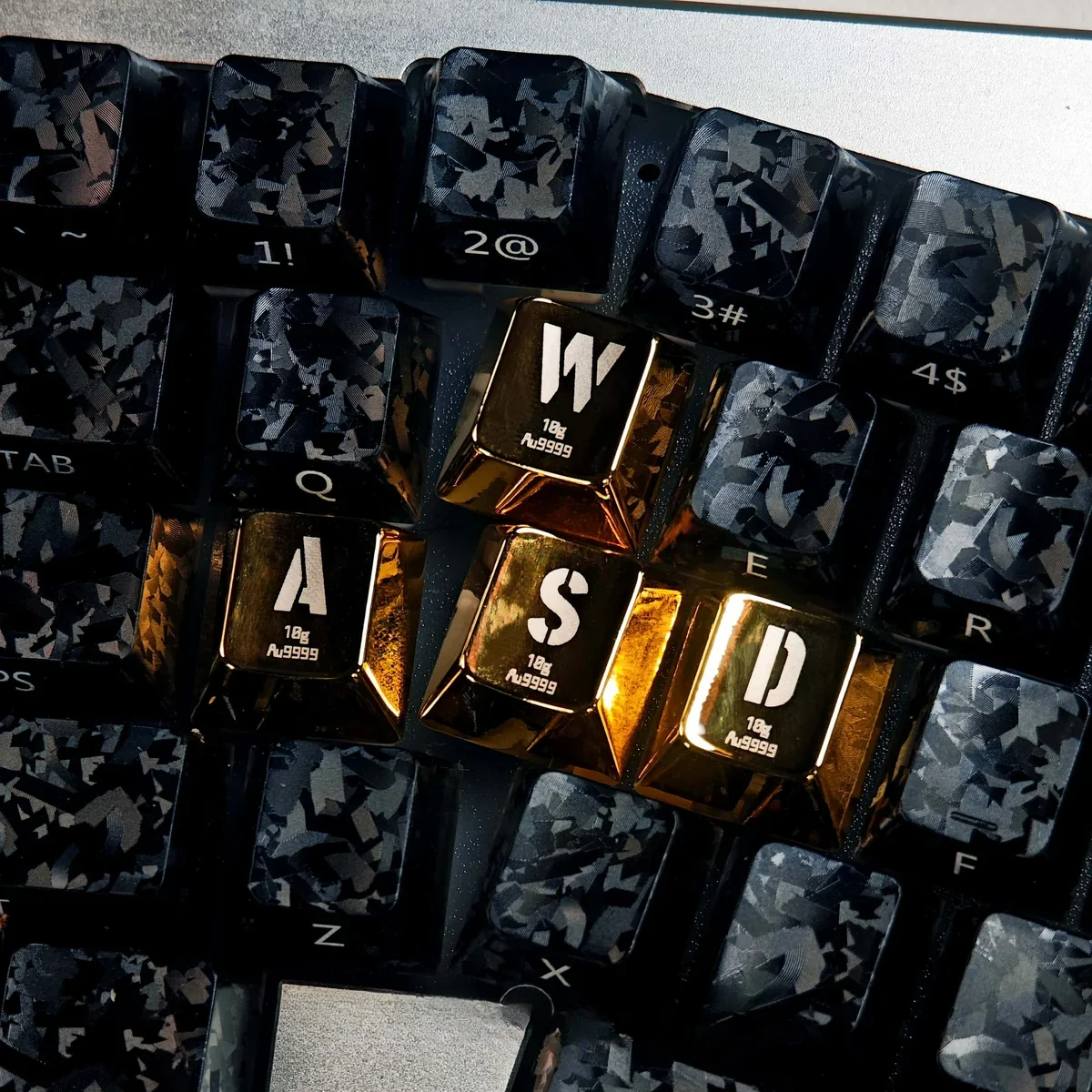 Premium gold WASD keycaps gleaming with a metallic finish, designed for high-performance gaming and exuding luxury on a keyboard.