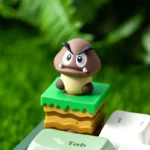 Vibrant, handcrafted Interactive Rotating Goomba Keycap for Super Mario fans, showcasing the iconic Goomba with a playful spinning feature.