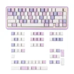 Close-up of the indulgent Grape Mousse PBT Dye-Sub Keycap Set showcasing soft hues inspired by dessert, from a unique angle.