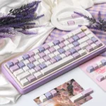 Indulgent Grape Mousse PBT Dye-Sub Keycap Set, showcasing soft hues inspired by a luxurious dessert. Premium visual delight.