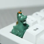 Handcrafted resin Green Pony Keycap, showcasing intricate whimsical green meadow details from a new angle. Adds pastoral charm.