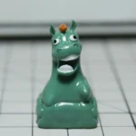 Handcrafted resin Green Pony Keycap, a whimsical green meadow artisan piece bringing enchanting pastoral charm to your desktop.