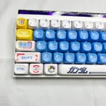 Legendary RX-78-2 Gundam MOA PBT keycap set from multiple angles, featuring iconic design, classic colors, bold legends, and rounded MOA profile.