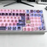 Close-up of the premium Strike Freedom Gundam PBT dye-sublimated keycap set, highlighting its sleek, high-contrast mecha design and exclusive craftsmanship.