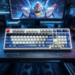 Strike Freedom Gundam PBT keycap set views, featuring sleek, high-contrast dye-sublimated mecha silhouettes. An iconic, quality Gundam keycap set.