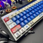 Gundam V2 PBT backlit keycap set for mechanical keyboards, featuring vibrant futuristic mecha designs. Durable PBT material shown from various angles.