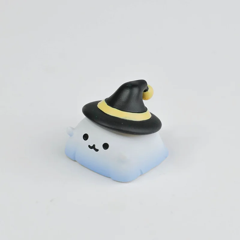 Charming handcrafted resin artisan keycap showcasing a sculpted white ghost figure, bringing whimsical Halloween spirit to your keyboard.