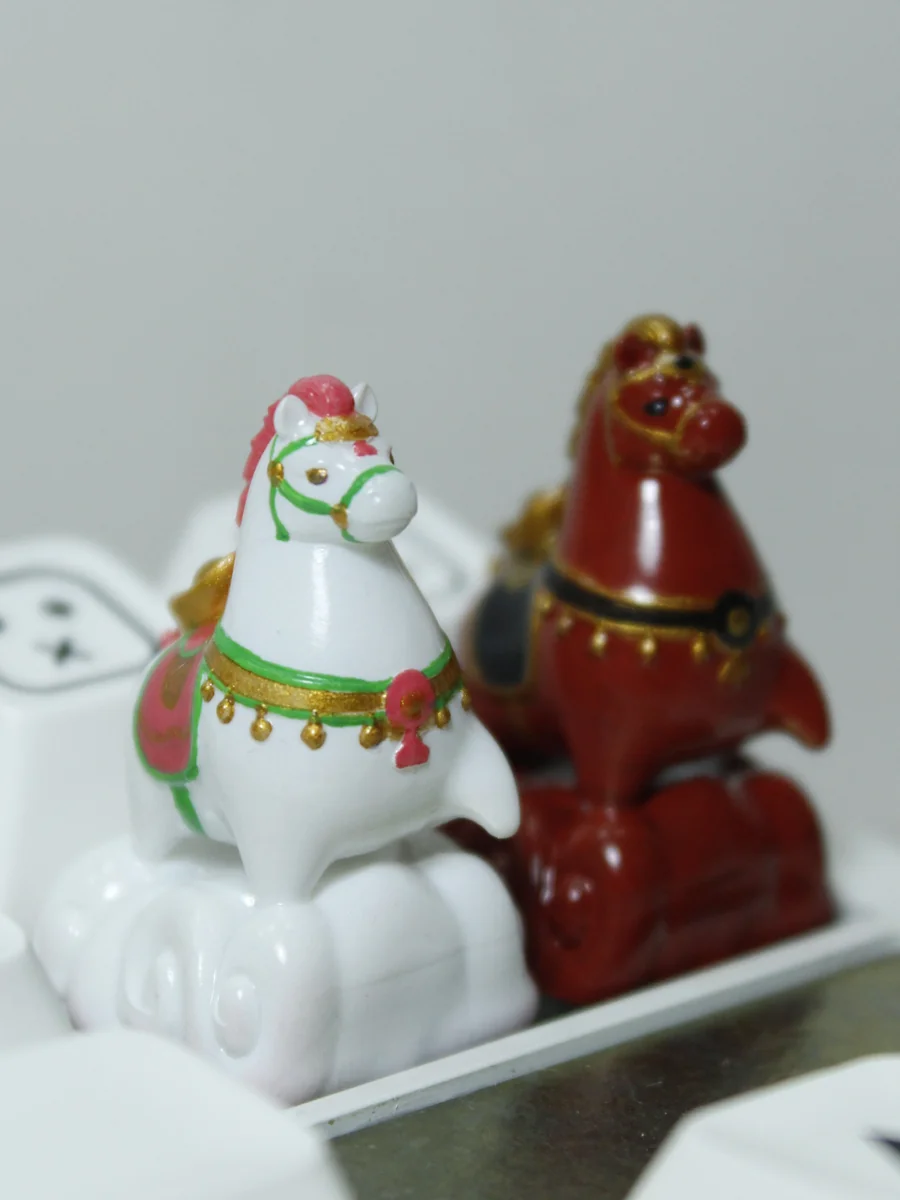 Handcrafted auspicious horse resin keycap featuring a charming, vibrant pony symbolizing luck and prosperity, perfect for mechanical keyboards.