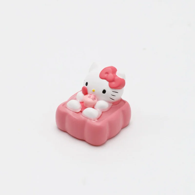 Close-up of the exclusive Hello Kitty dessert artisan ESC keycap, showcasing its whimsical design and adorable sweet treats from multiple angles.