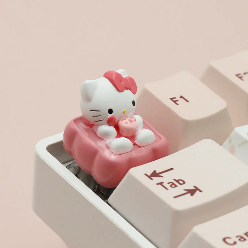 Exclusive Hello Kitty dessert artisan ESC keycap, highlighting whimsical details from a playful angle. A sweet, nostalgic desktop accent.