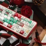 Close-up of the iconic Hello Kitty Christmas PBT keycap set, showcasing various adorable keycaps with festive designs from multiple angles.
