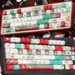 Explore the Hello Kitty Christmas PBT keycap set from various angles, featuring charming festive designs and adorable character art.