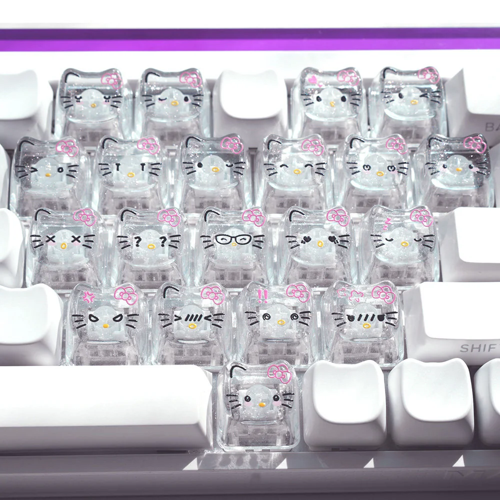 Playful Hello Kitty glitter backlit PC keycaps set featuring transparent design, sparkling hearts, and cute cat cartoons for a vibrant keyboard.