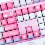 Exclusive Honkai Star Rail Cyrene PBT gaming keycaps set, showcasing its ethereal sci-fi aesthetic and intricate character details from multiple angle.