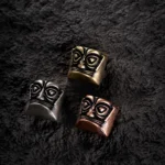 Sanxingdui Mask Keycap, pure copper, detailed views. Ancient bronze mystique meets whimsical pop culture, creating mystical charm.