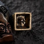 Detailed Sanxingdui Mask Keycap in pure copper, showcasing its unique blend of ancient mystique and whimsical pop culture from various artistic angle.