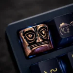 Sanxingdui Mask Keycap, Style three, showcasing the unique pure copper design with an artistic blend of ancient mystique and whimsical pop culture.