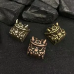 Handcrafted Japanese Oni samurai artisan keycap, detailed from an alternative angle, highlighting its striking bright and vintage finishes.