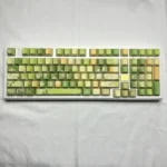 Elegant Jasmine PBT Keycaps Set main image, featuring translucent side-engraved legends with delicate jasmine florals and modern angles, enhanced by subtle angle.