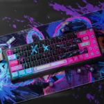 Close-up of the Jinx Arcane PBT+PC keycaps set from a dynamic angle, highlighting their vibrant, chaotic punk aesthetic and exclusive gaming design.